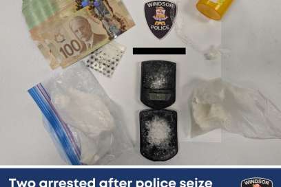 Two Arrested After Police Seize Nearly $60,000 In Drugs And Cash