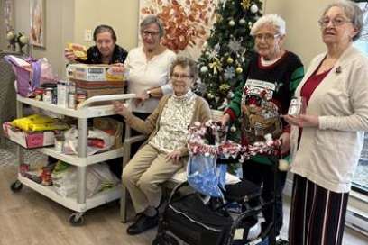 Seasons Belle River Spreads Holiday Cheer With Canned Goods Donation To Local Food Bank